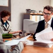 Car accident victim receiving legal advice from a personal injury attorney