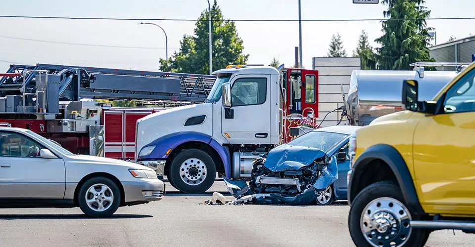 Truck accident on Utah highway with emergency responders at the scene