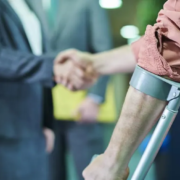 Personal injury lawyer in Utah reviewing case documents with a client