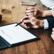 Personal injury lawyer in Utah discussing case with an injured client