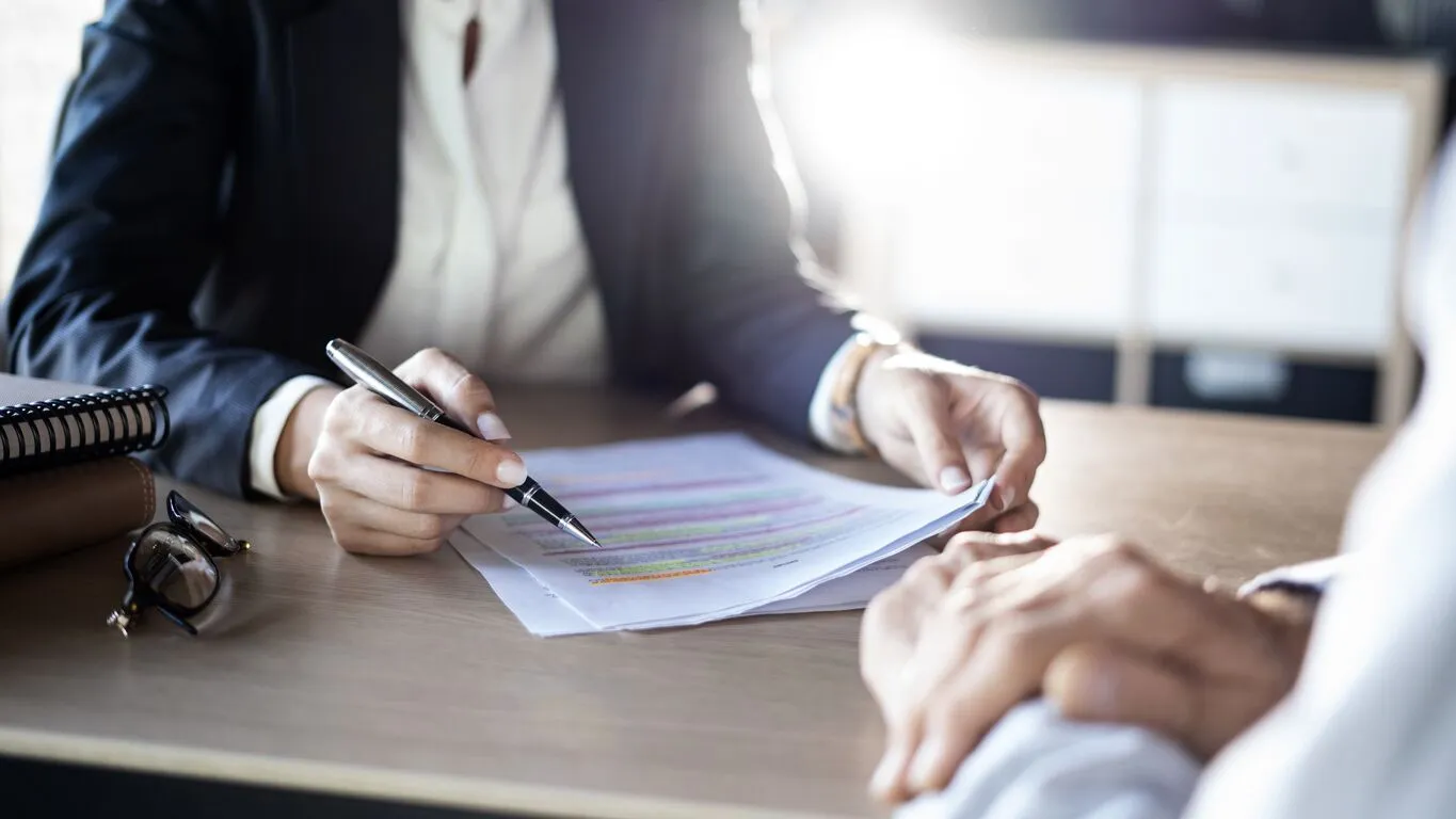 Utah accident injury attorney consulting with a client