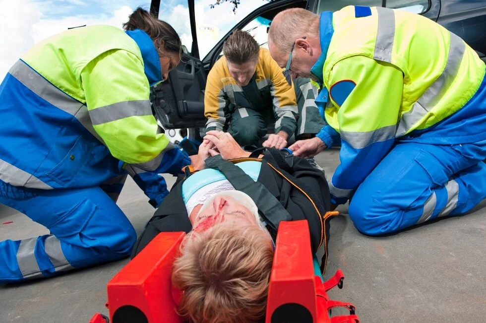 Accident Attorneys discussing case strategy with injured client to maximize compensation"