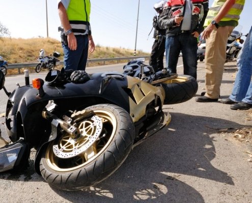 Utah motorcycle accident lawyer advising injured rider during consultation