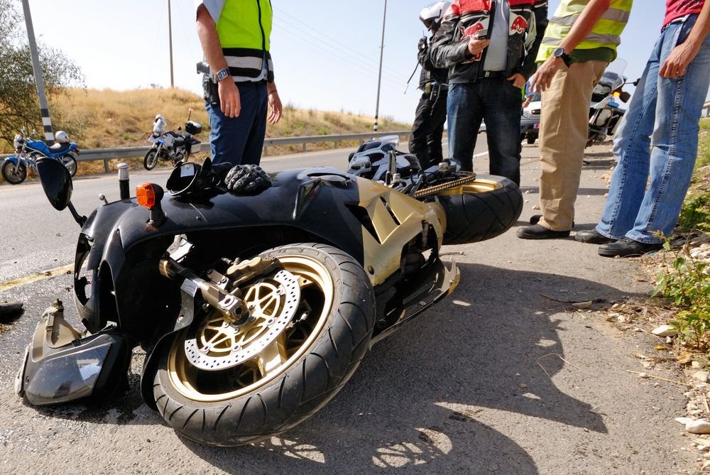 Utah motorcycle accident lawyer advising injured rider during consultation